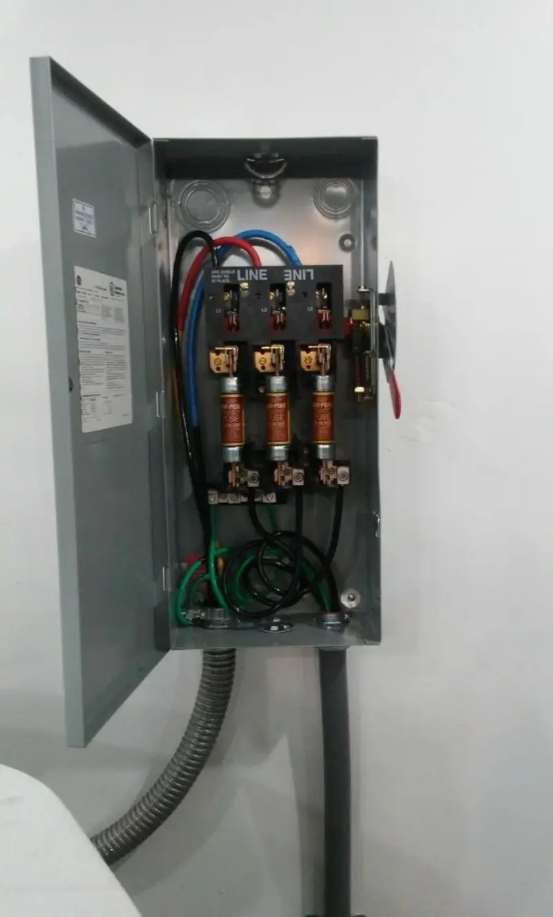 Three-phase disconnect switch installed for Smoke Detector Installation in Williamsburg